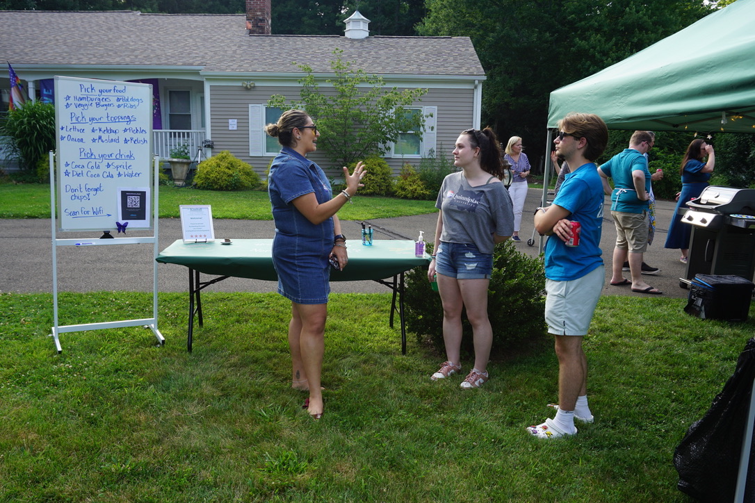 Community members speaking at a Dr. Kathleen Kimball campaign event